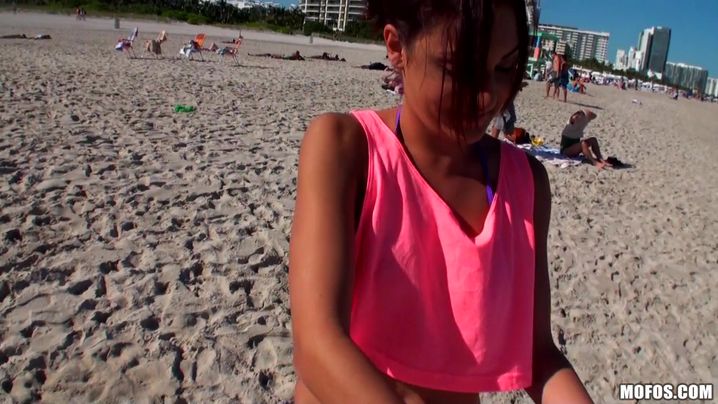 Striking Nikki Chase is gently rubbing man's penis with her soft lips